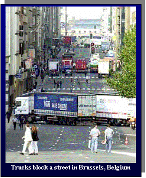 Text Box:  
Trucks block a street in Brussels, Belgium
